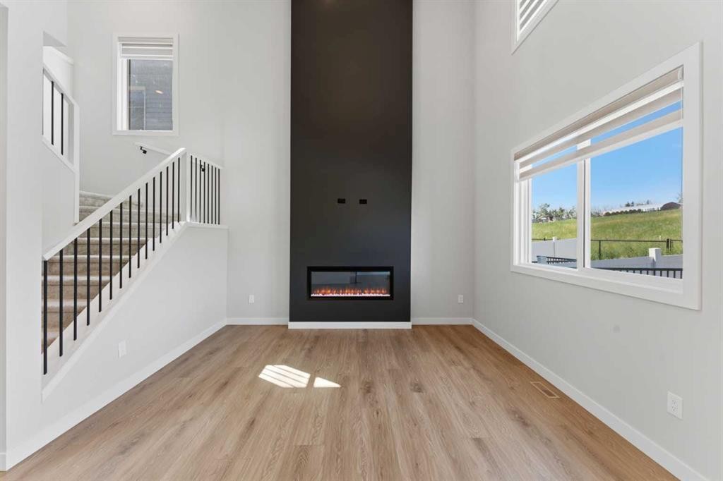 3081 Key Drive Sw, Airdrie, AB - Indoor With Fireplace