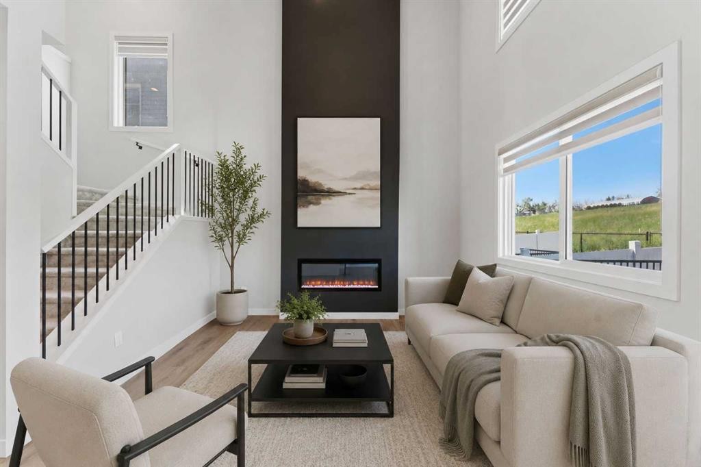 3081 Key Drive Sw, Airdrie, AB - Indoor Photo Showing Living Room With Fireplace