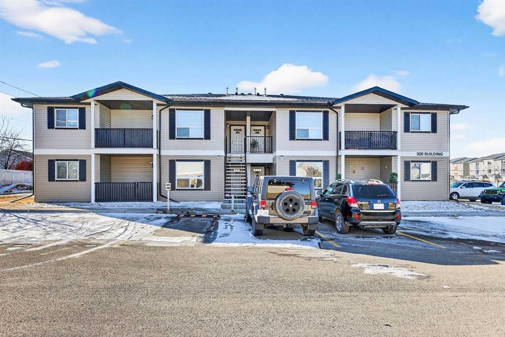 302-8 Bayside Place, Strathmore, AB - Outdoor With Facade