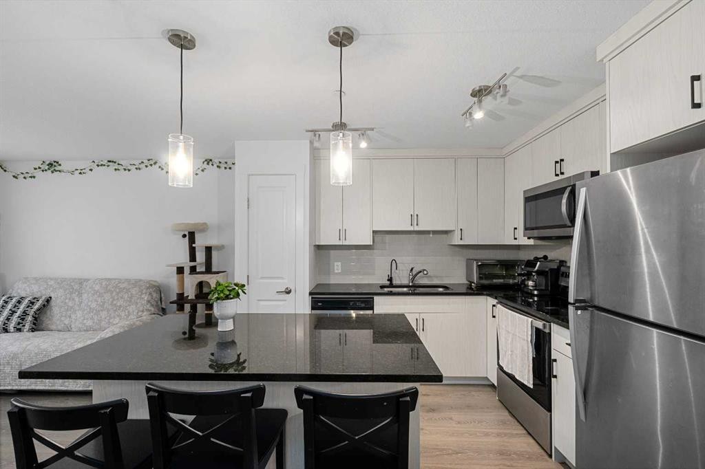 238 Livingston Common Ne, Calgary, AB - Indoor Photo Showing Kitchen With Stainless Steel Kitchen With Upgraded Kitchen