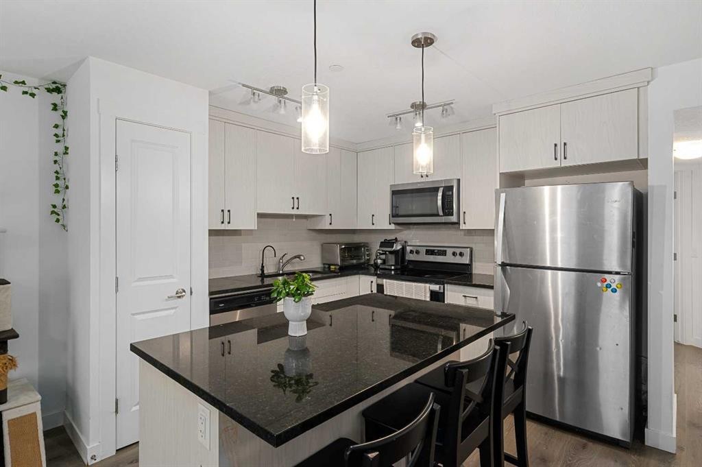 238 Livingston Common Ne, Calgary, AB - Indoor Photo Showing Kitchen With Stainless Steel Kitchen With Upgraded Kitchen