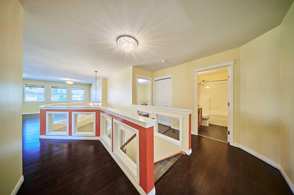 62 Crestmont Drive Sw, Calgary, AB - Indoor Photo Showing Other Room