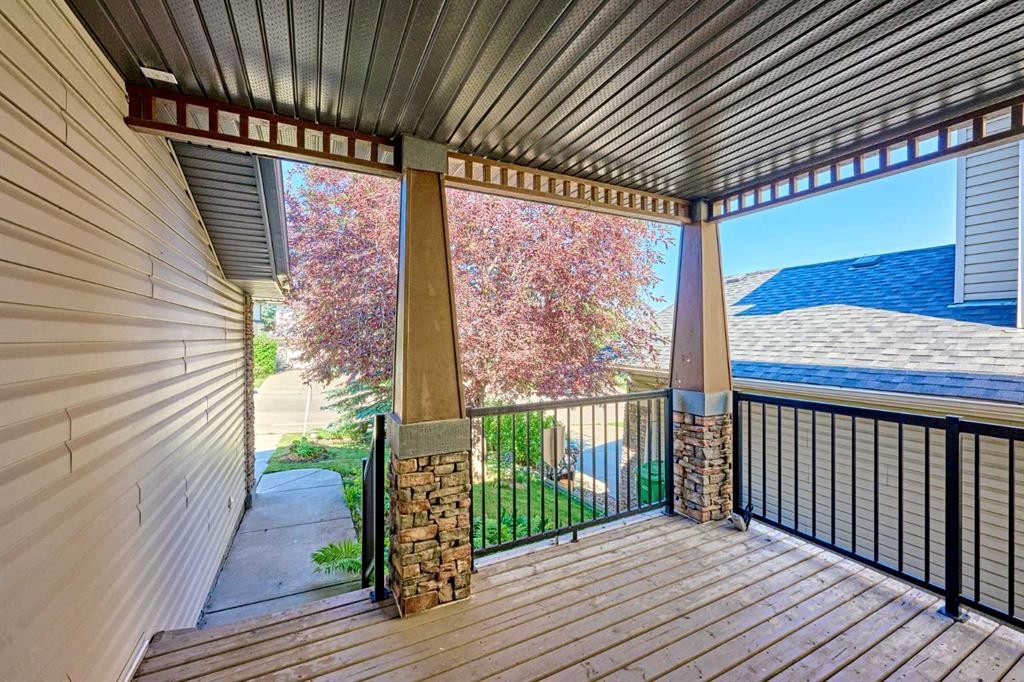 62 Crestmont Drive Sw, Calgary, AB - Outdoor With Deck Patio Veranda With Exterior