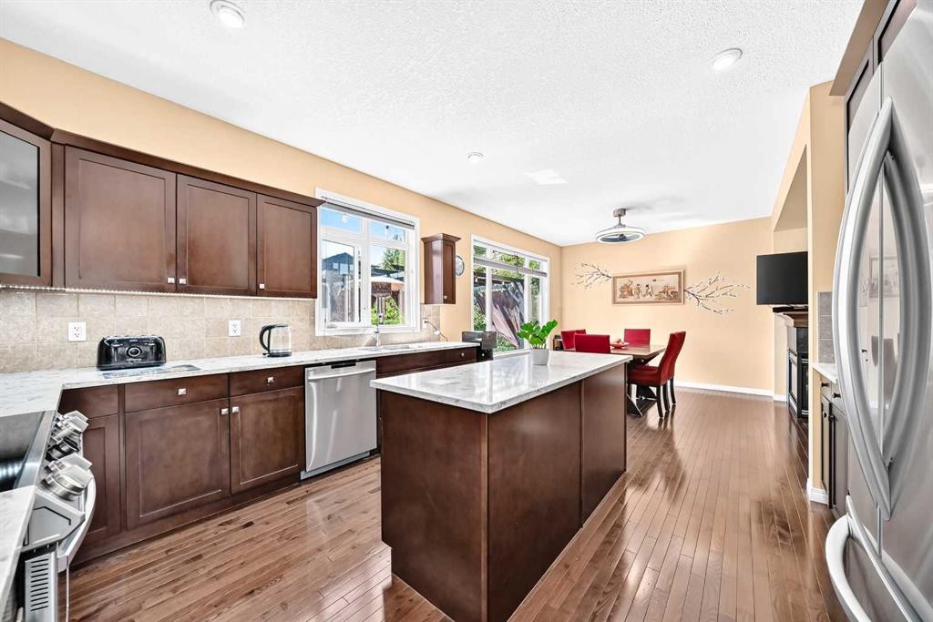 29 Westridge Crescent, Okotoks, AB - Indoor Photo Showing Kitchen With Double Sink