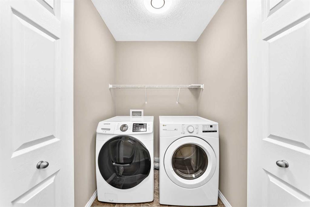 29 Westridge Crescent, Okotoks, AB - Indoor Photo Showing Laundry Room