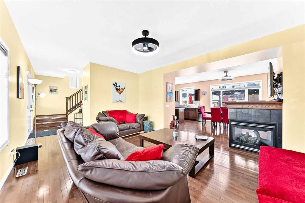 29 Westridge Crescent, Okotoks, AB - Indoor Photo Showing Living Room With Fireplace