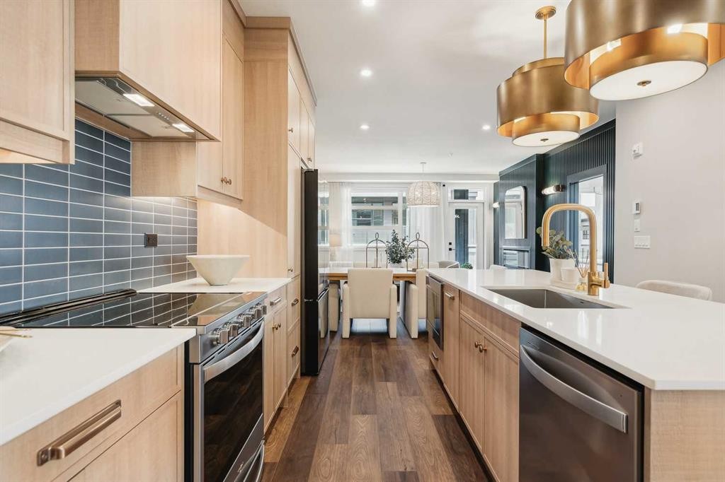 2301-55 Lucas Way Nw, Calgary, AB - Indoor Photo Showing Kitchen With Stainless Steel Kitchen With Upgraded Kitchen