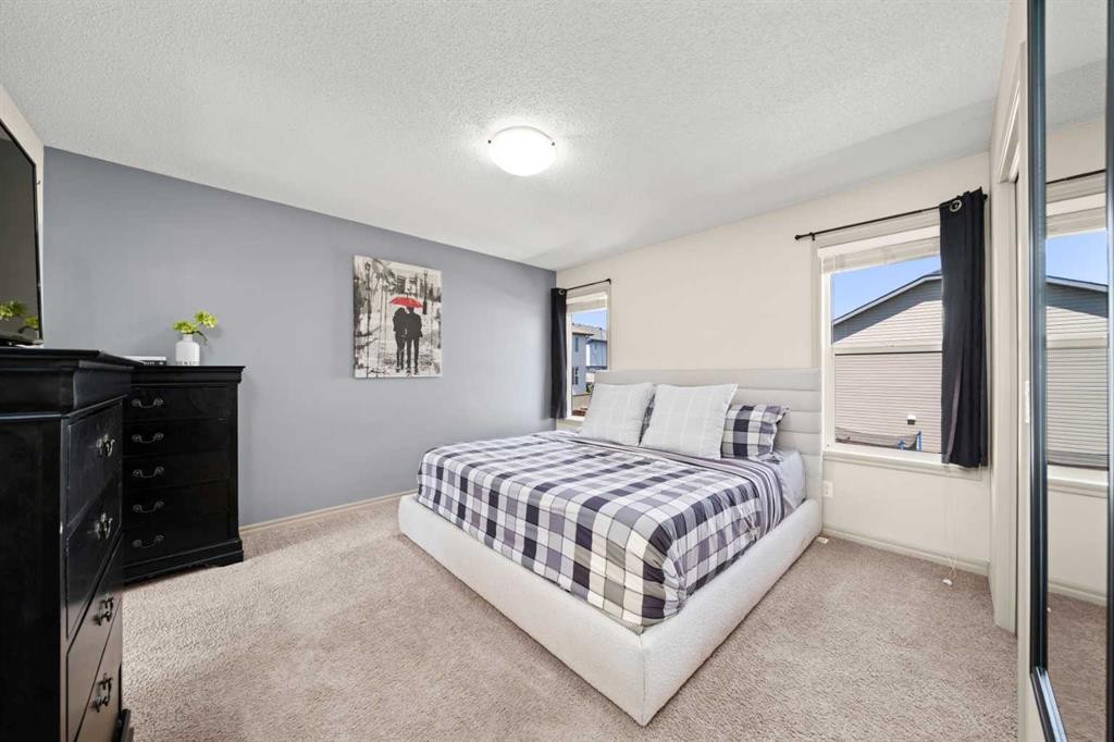 277 Brightonwoods Gardens Se, Calgary, AB - Indoor Photo Showing Bedroom