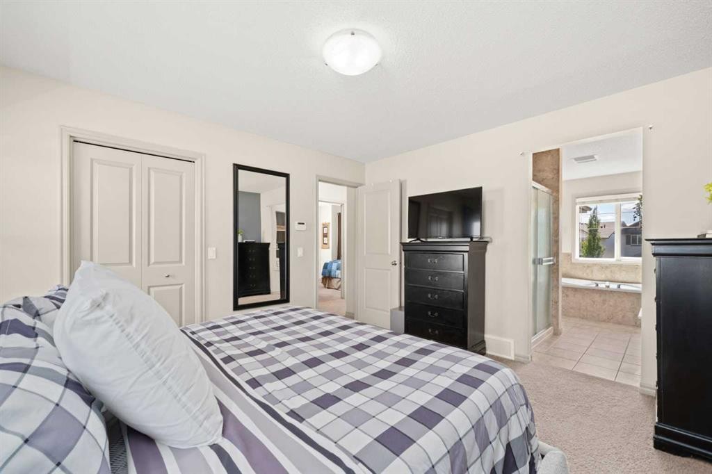 277 Brightonwoods Gardens Se, Calgary, AB - Indoor Photo Showing Bedroom