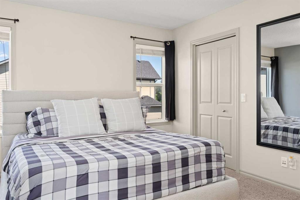 277 Brightonwoods Gardens Se, Calgary, AB - Indoor Photo Showing Bedroom