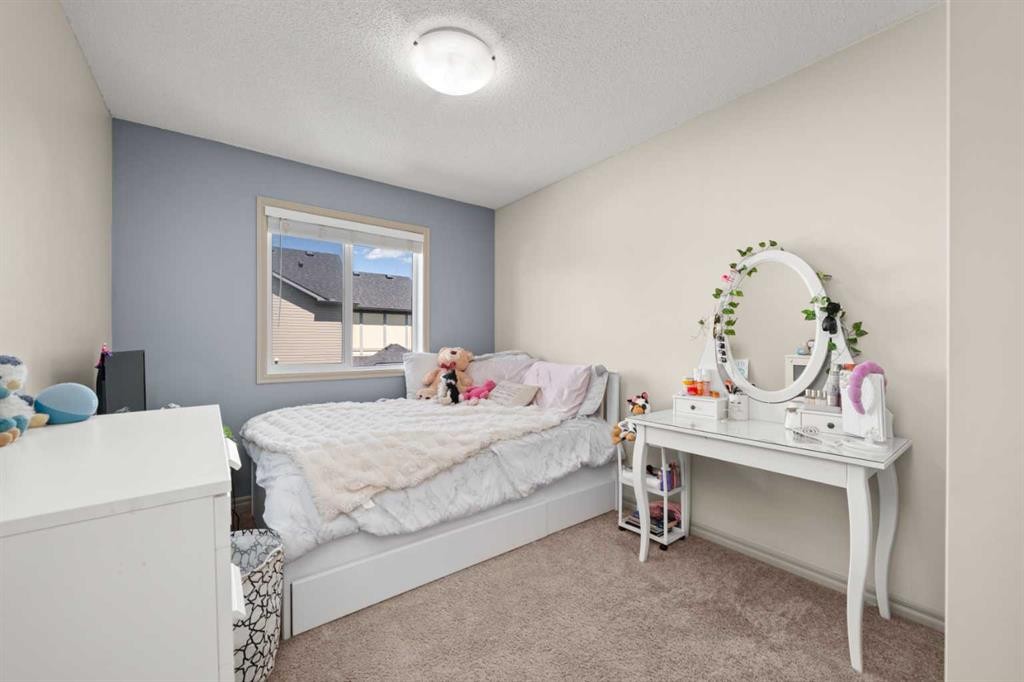 277 Brightonwoods Gardens Se, Calgary, AB - Indoor Photo Showing Bedroom
