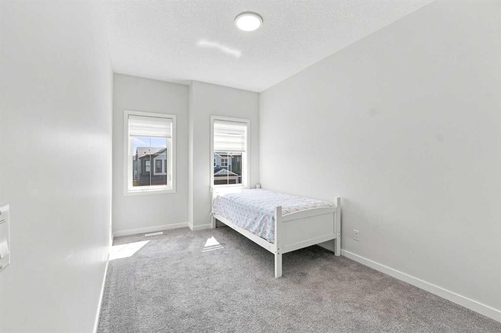 26 Homestead Circle Ne, Calgary, AB - Indoor Photo Showing Bedroom