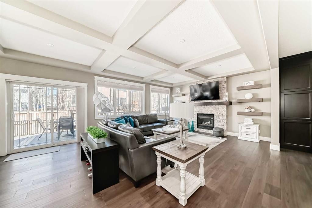 120 Kinniburgh Circle, Chestermere, AB - Indoor Photo Showing Living Room With Fireplace