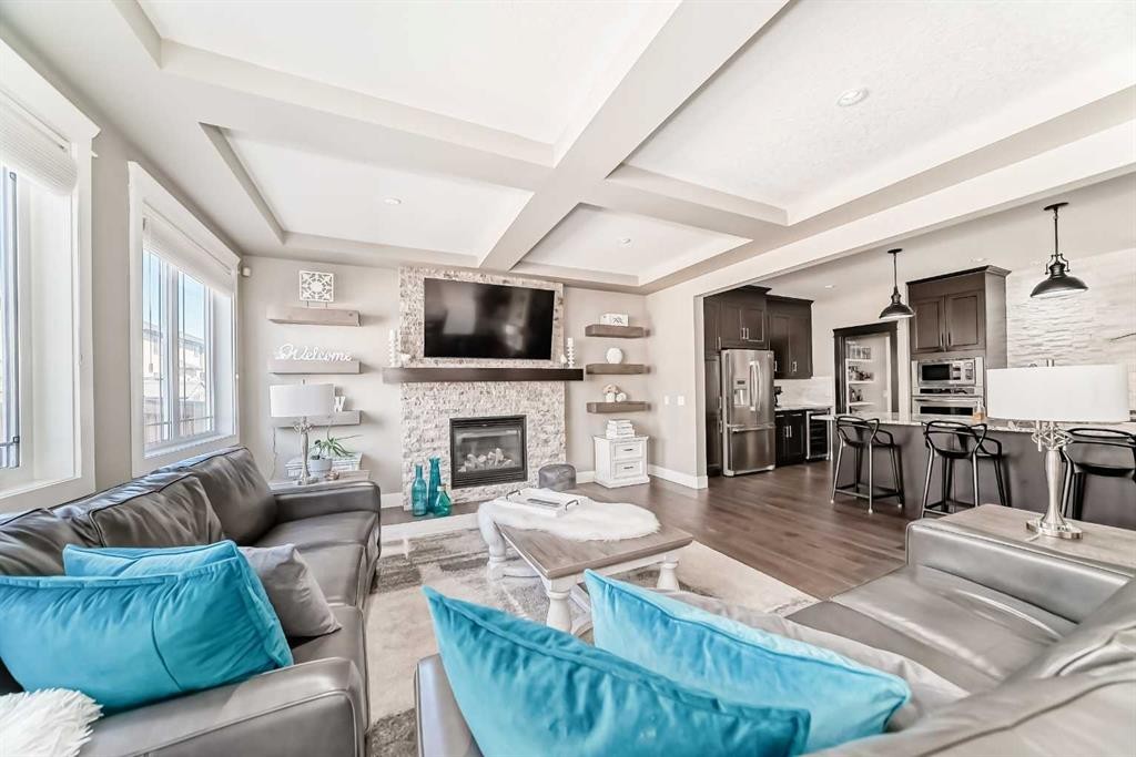120 Kinniburgh Circle, Chestermere, AB - Indoor Photo Showing Living Room With Fireplace