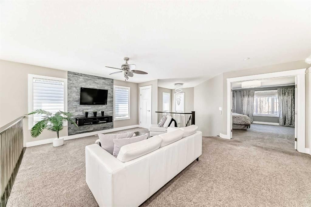 120 Kinniburgh Circle, Chestermere, AB - Indoor Photo Showing Living Room