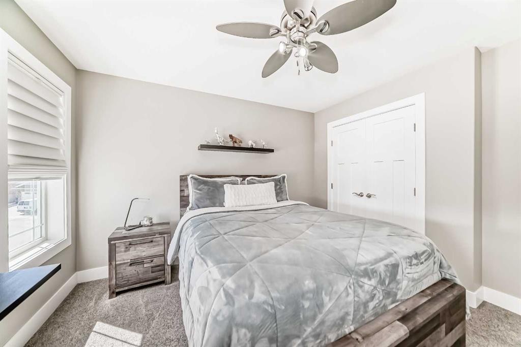 120 Kinniburgh Circle, Chestermere, AB - Indoor Photo Showing Bedroom