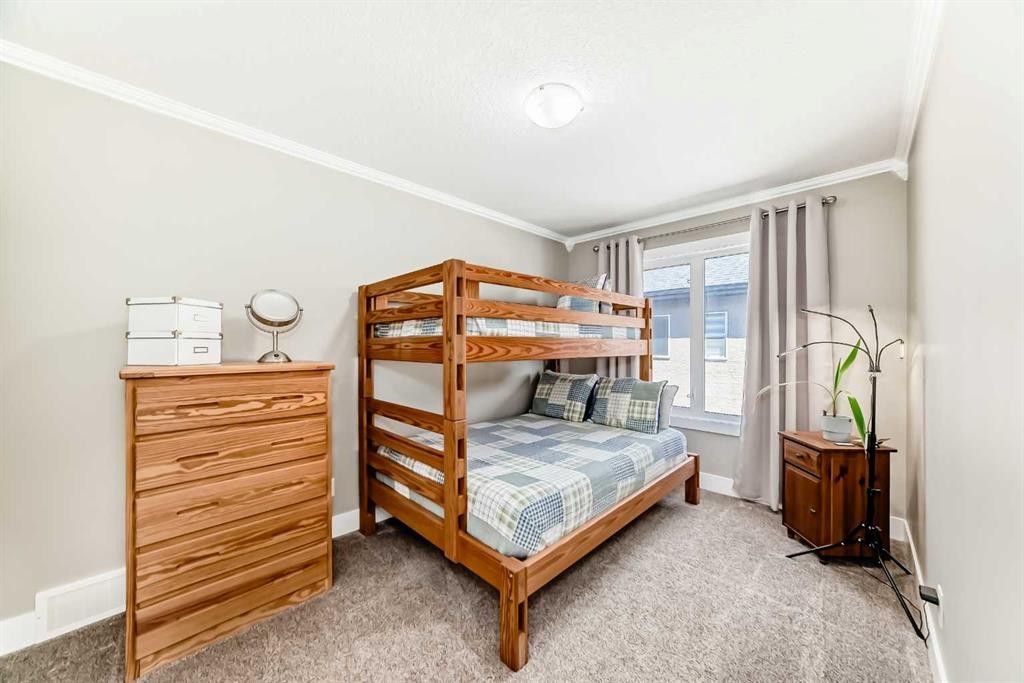 120 Kinniburgh Circle, Chestermere, AB - Indoor Photo Showing Bedroom