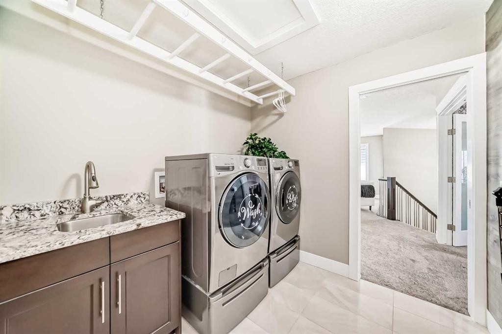120 Kinniburgh Circle, Chestermere, AB - Indoor Photo Showing Laundry Room