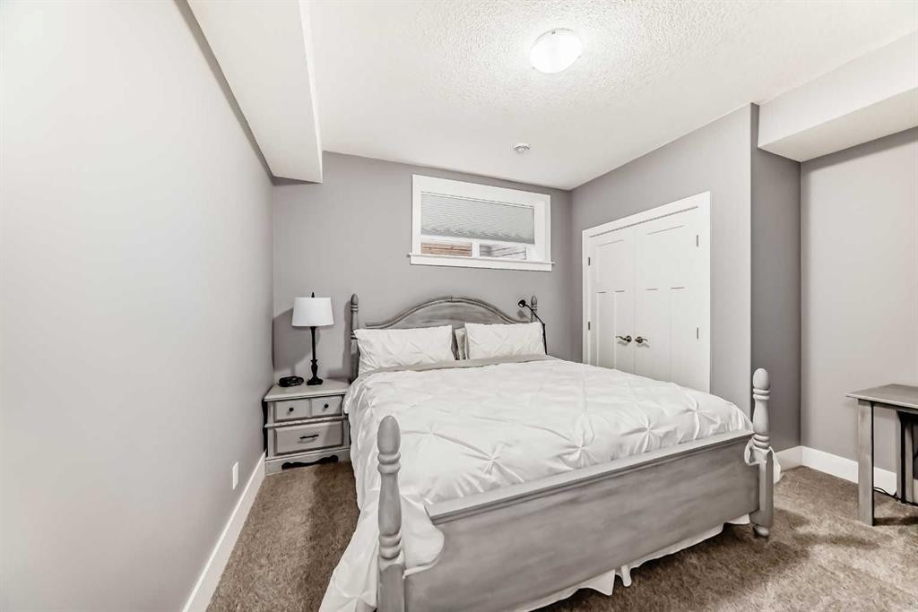 120 Kinniburgh Circle, Chestermere, AB - Indoor Photo Showing Bedroom