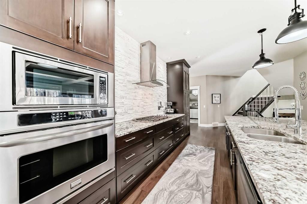 120 Kinniburgh Circle, Chestermere, AB - Indoor Photo Showing Kitchen With Double Sink With Upgraded Kitchen