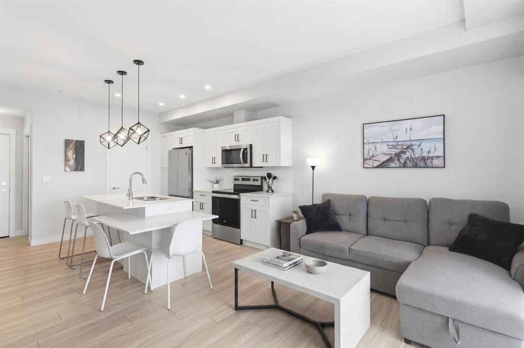 220-400 Auburn Meadows Common Se, Calgary, AB - Indoor Photo Showing Living Room