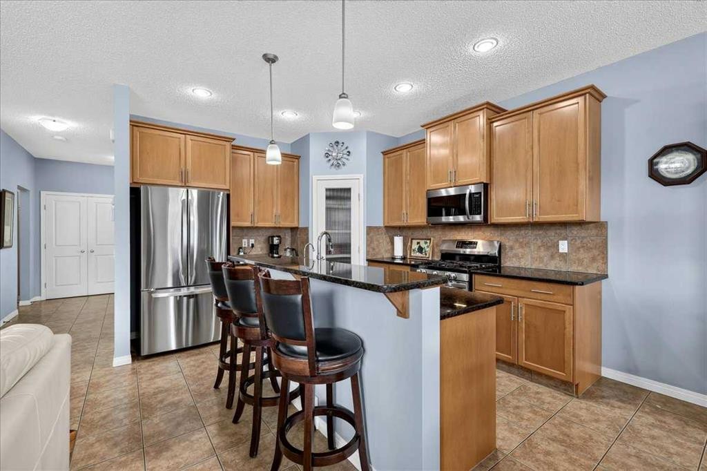 18 Copperstone Drive Se, Calgary, AB - Indoor Photo Showing Kitchen With Stainless Steel Kitchen