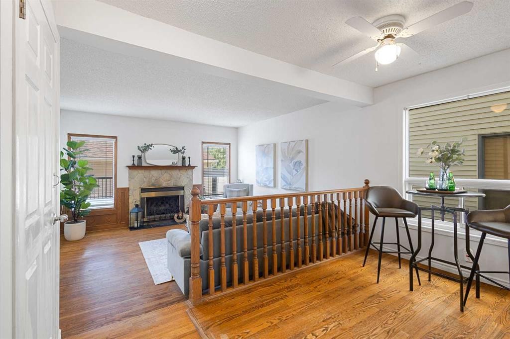 1132 Millcrest Rise Sw, Calgary, AB - Indoor With Fireplace