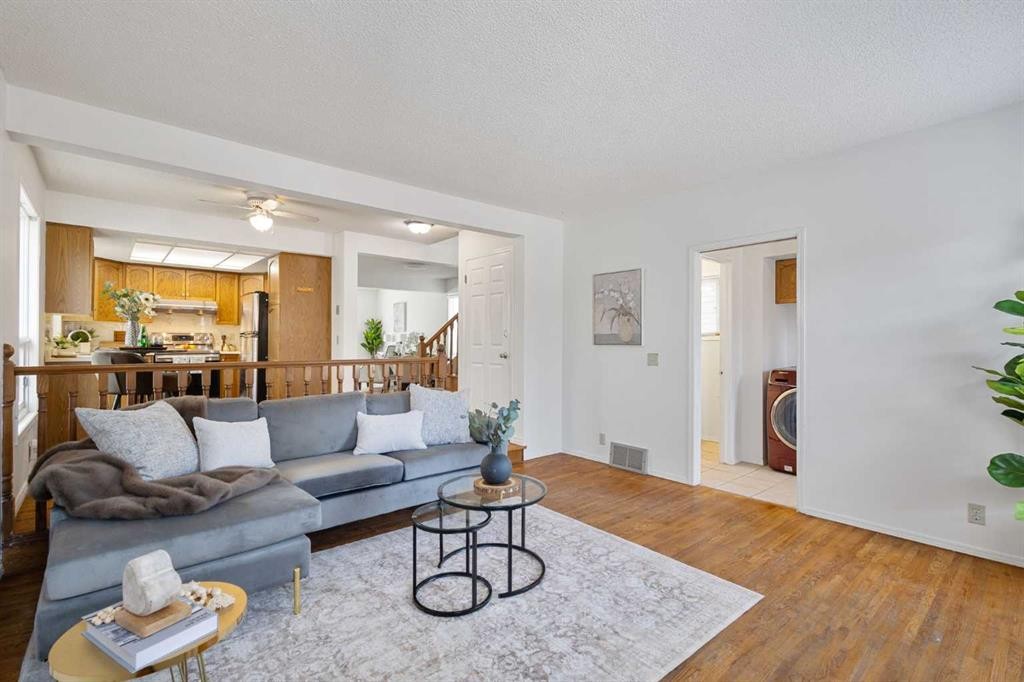 1132 Millcrest Rise Sw, Calgary, AB - Indoor Photo Showing Living Room