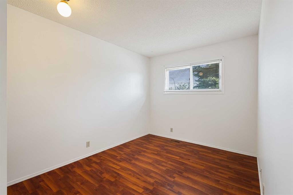 1132 Millcrest Rise Sw, Calgary, AB - Indoor Photo Showing Other Room