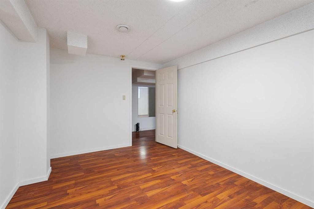 1132 Millcrest Rise Sw, Calgary, AB - Indoor Photo Showing Other Room