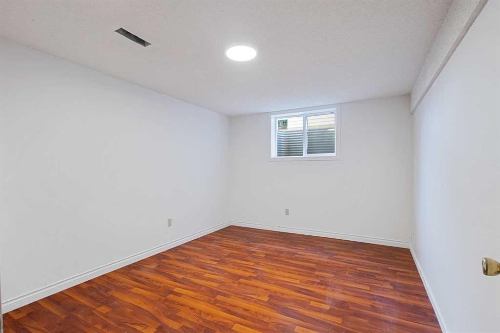 1132 Millcrest Rise Sw, Calgary, AB - Indoor Photo Showing Other Room