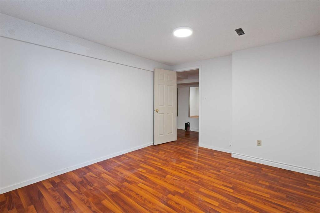 1132 Millcrest Rise Sw, Calgary, AB - Indoor Photo Showing Other Room