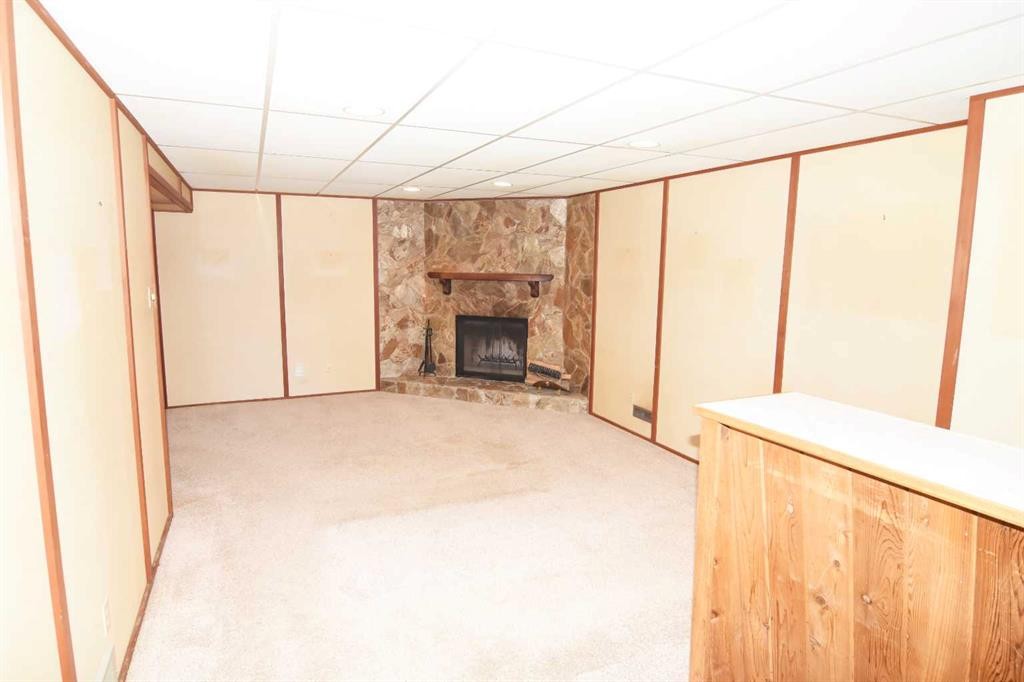 36 Cheyenne Crescent Nw, Calgary, AB - Indoor Photo Showing Other Room With Fireplace