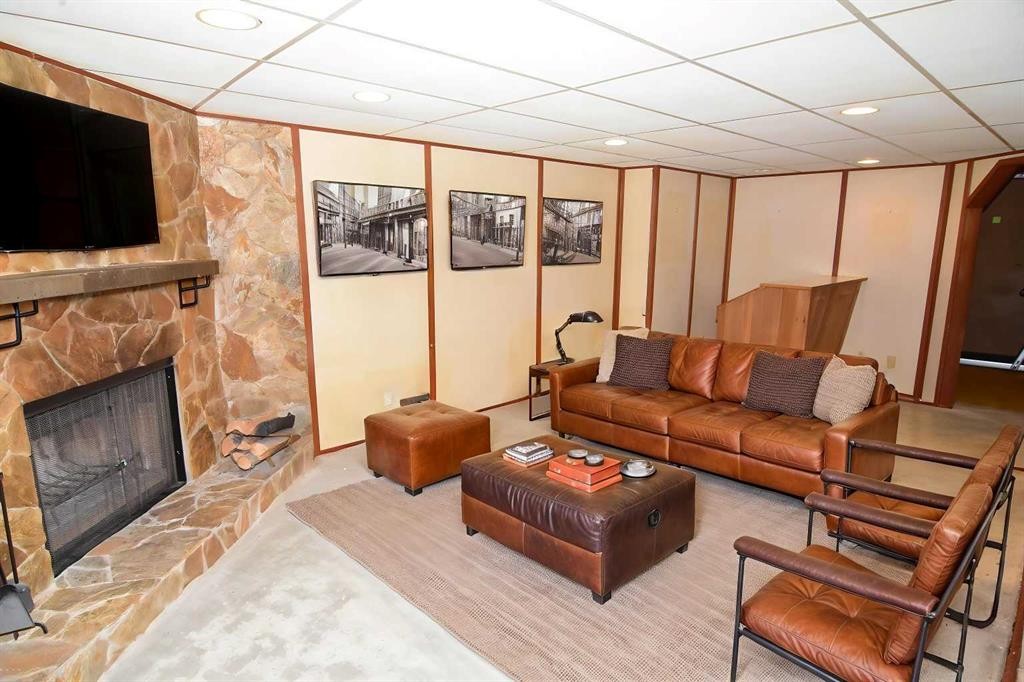 36 Cheyenne Crescent Nw, Calgary, AB - Indoor Photo Showing Living Room With Fireplace