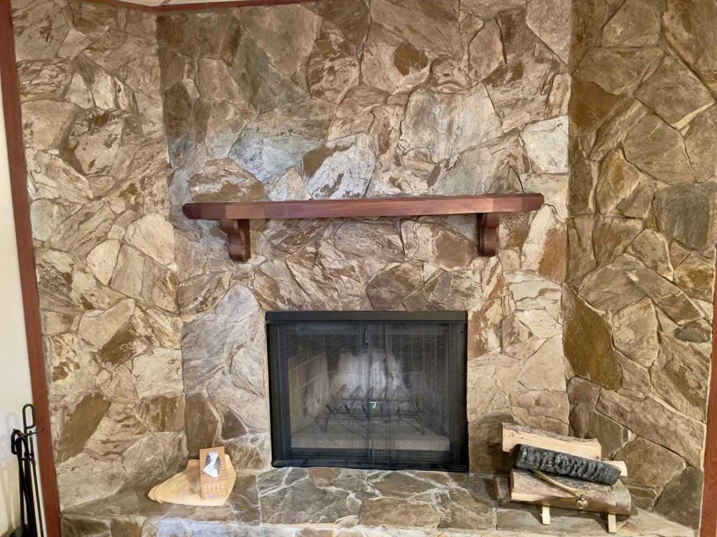 36 Cheyenne Crescent Nw, Calgary, AB - Indoor Photo Showing Living Room With Fireplace