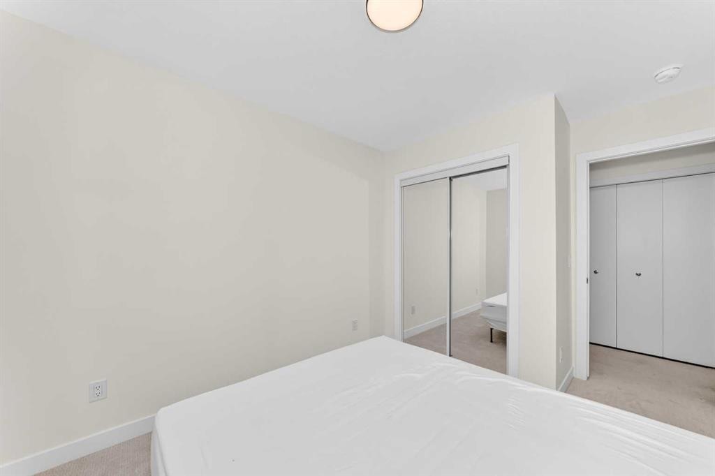 308-135 Belmont Passage Sw, Calgary, AB - Indoor Photo Showing Bedroom
