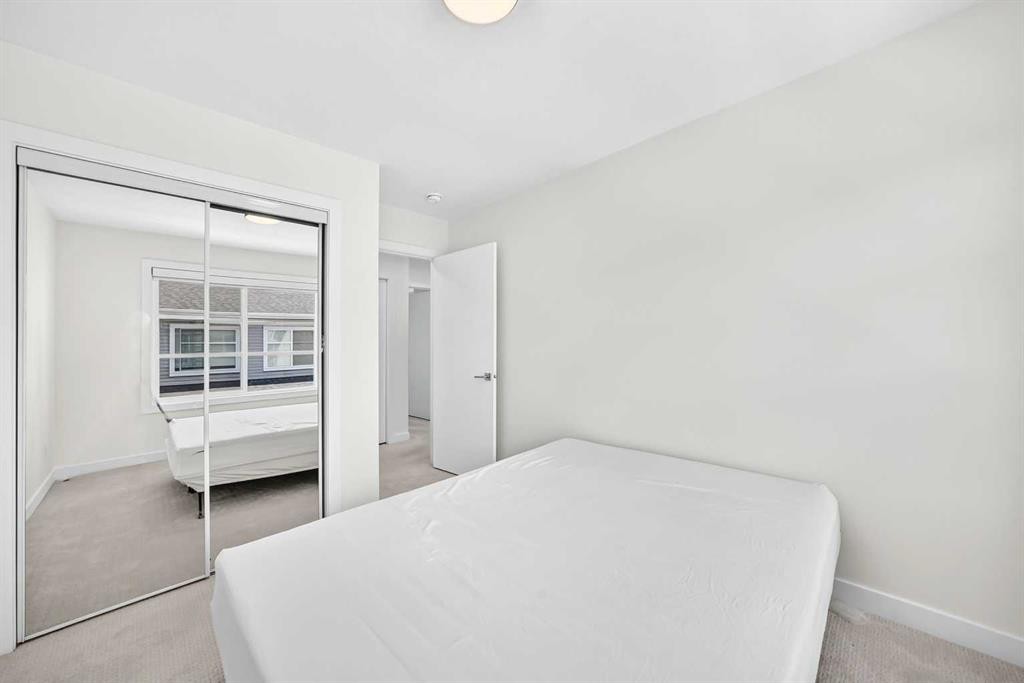308-135 Belmont Passage Sw, Calgary, AB - Indoor Photo Showing Bedroom