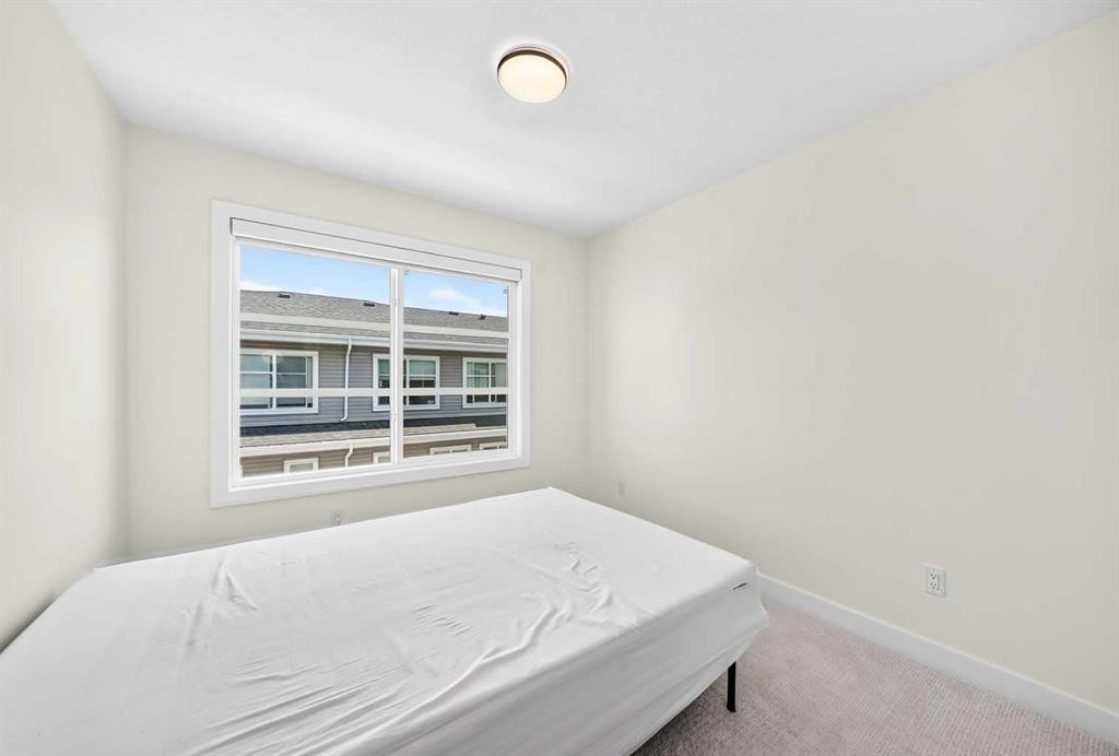 308-135 Belmont Passage Sw, Calgary, AB - Indoor Photo Showing Bedroom