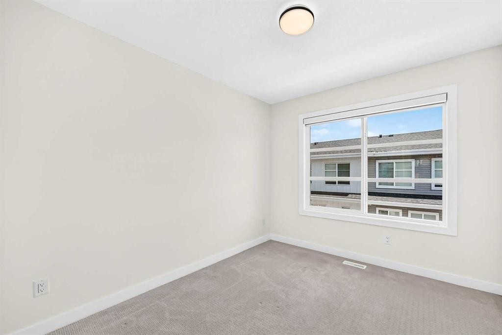 308-135 Belmont Passage Sw, Calgary, AB - Indoor Photo Showing Other Room