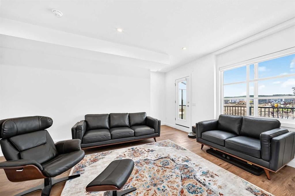 308-135 Belmont Passage Sw, Calgary, AB - Indoor Photo Showing Living Room