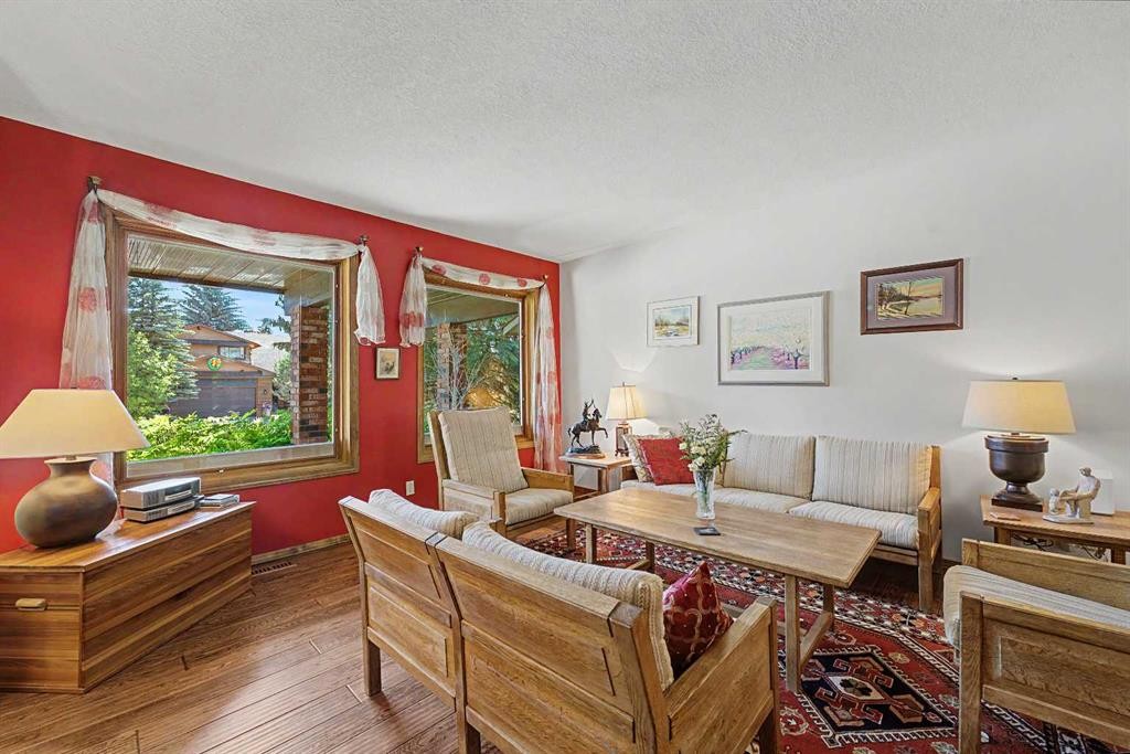 75 Deerbrook Road Se, Calgary, AB - Indoor Photo Showing Living Room
