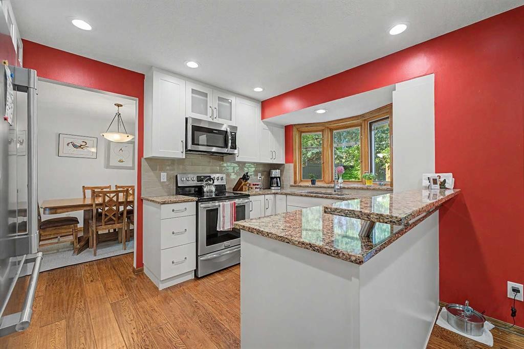 75 Deerbrook Road Se, Calgary, AB - Indoor Photo Showing Kitchen