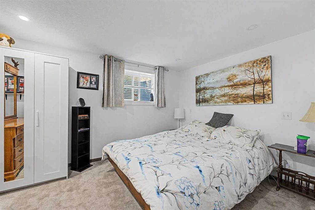 75 Deerbrook Road Se, Calgary, AB - Indoor Photo Showing Bedroom