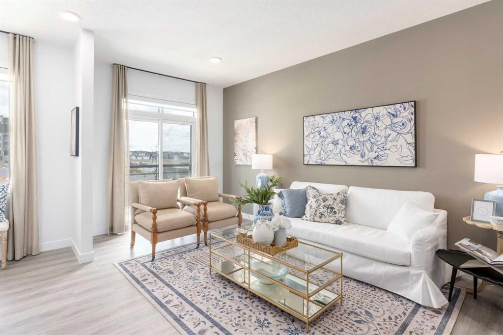 86 Heirloom Passage Se, Calgary, AB - Indoor Photo Showing Living Room