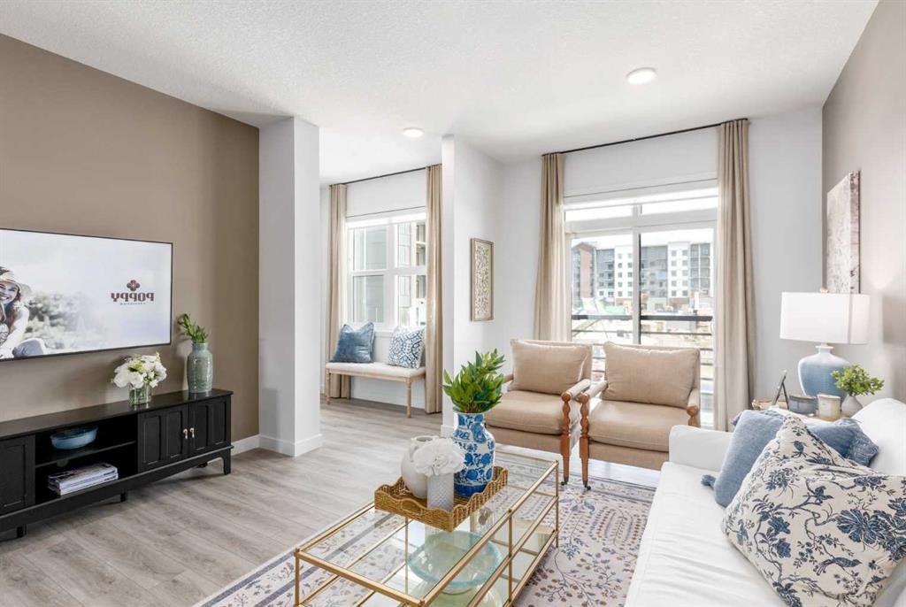 86 Heirloom Passage Se, Calgary, AB - Indoor Photo Showing Living Room