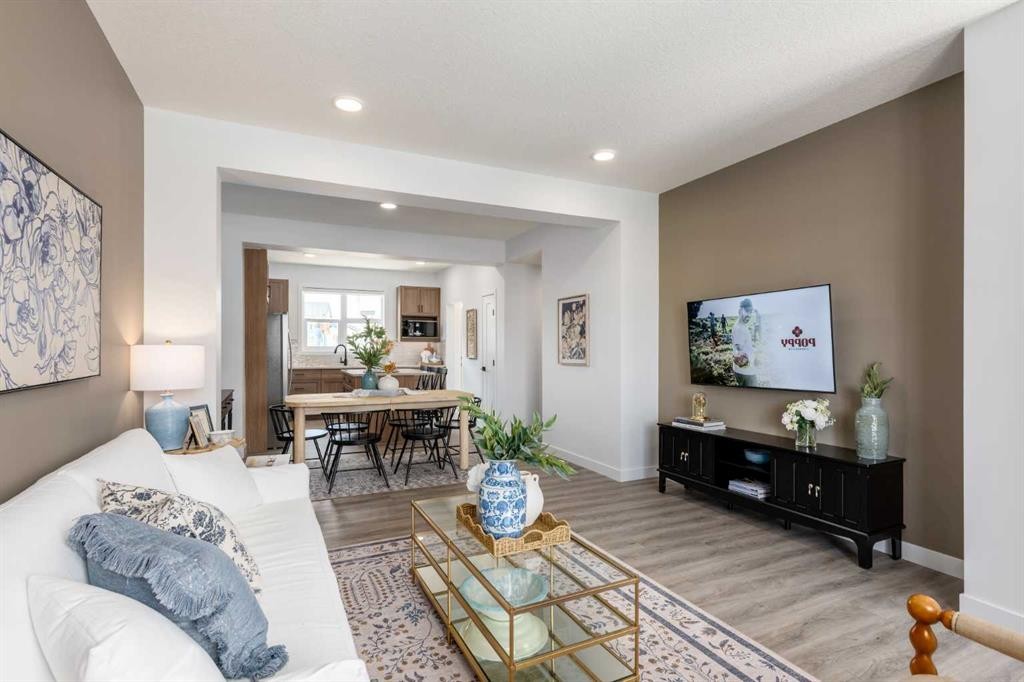 86 Heirloom Passage Se, Calgary, AB - Indoor Photo Showing Living Room