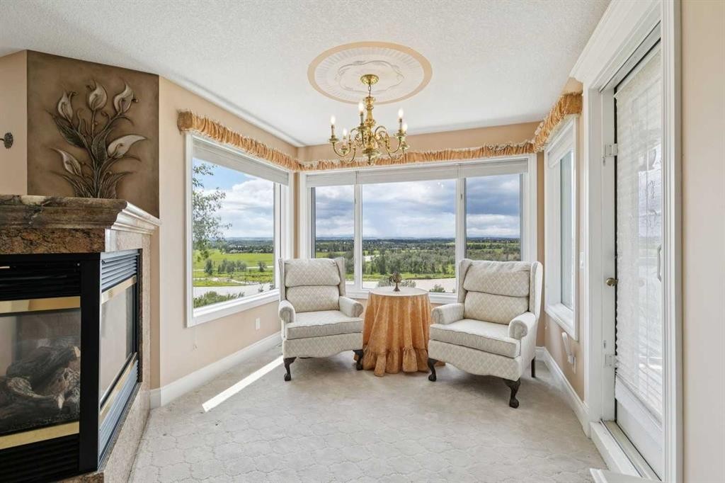 85 Mt Douglas Circle Se, Calgary, AB - Indoor Photo Showing Living Room With Fireplace