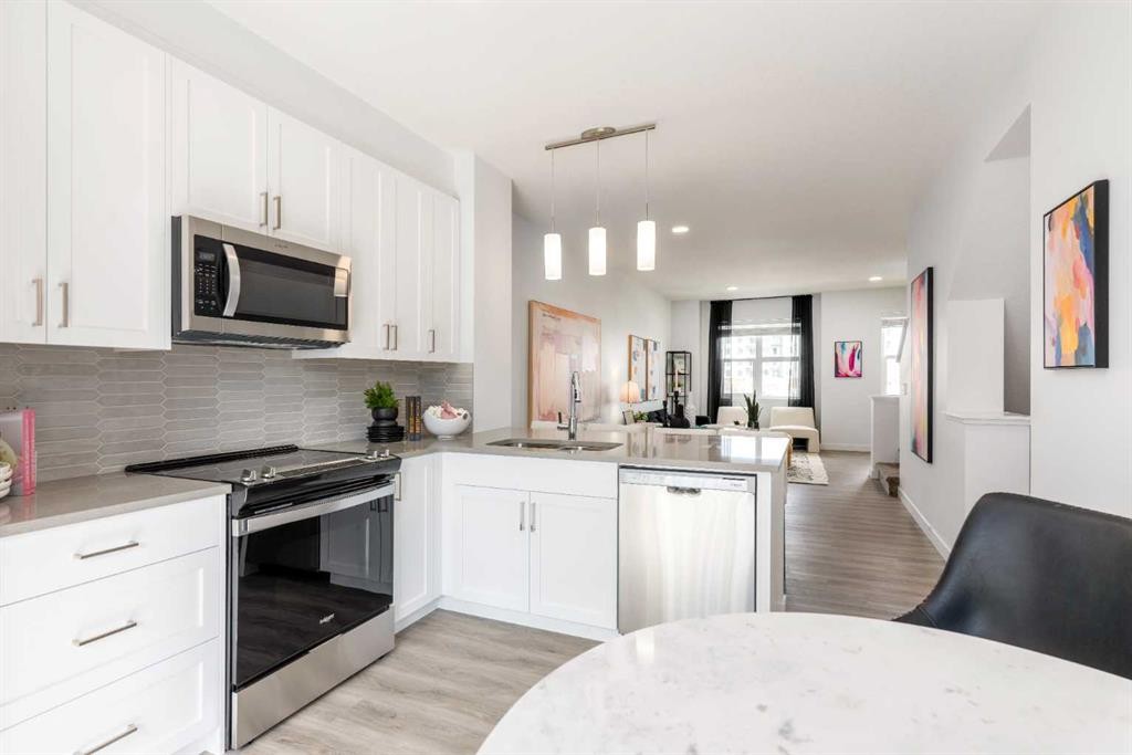 90 Heirloom Passage Se, Calgary, AB - Indoor Photo Showing Kitchen With Upgraded Kitchen