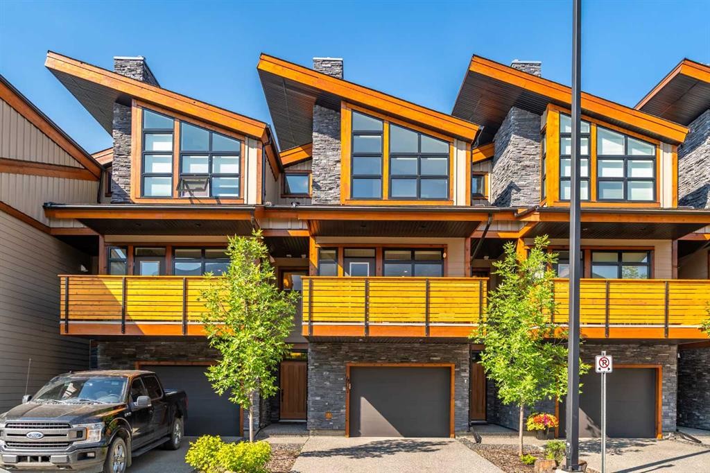 407 Riva Place, Canmore, AB - Outdoor With Facade