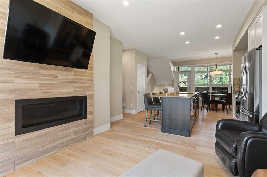 407 Riva Place, Canmore, AB - Indoor Photo Showing Living Room With Fireplace